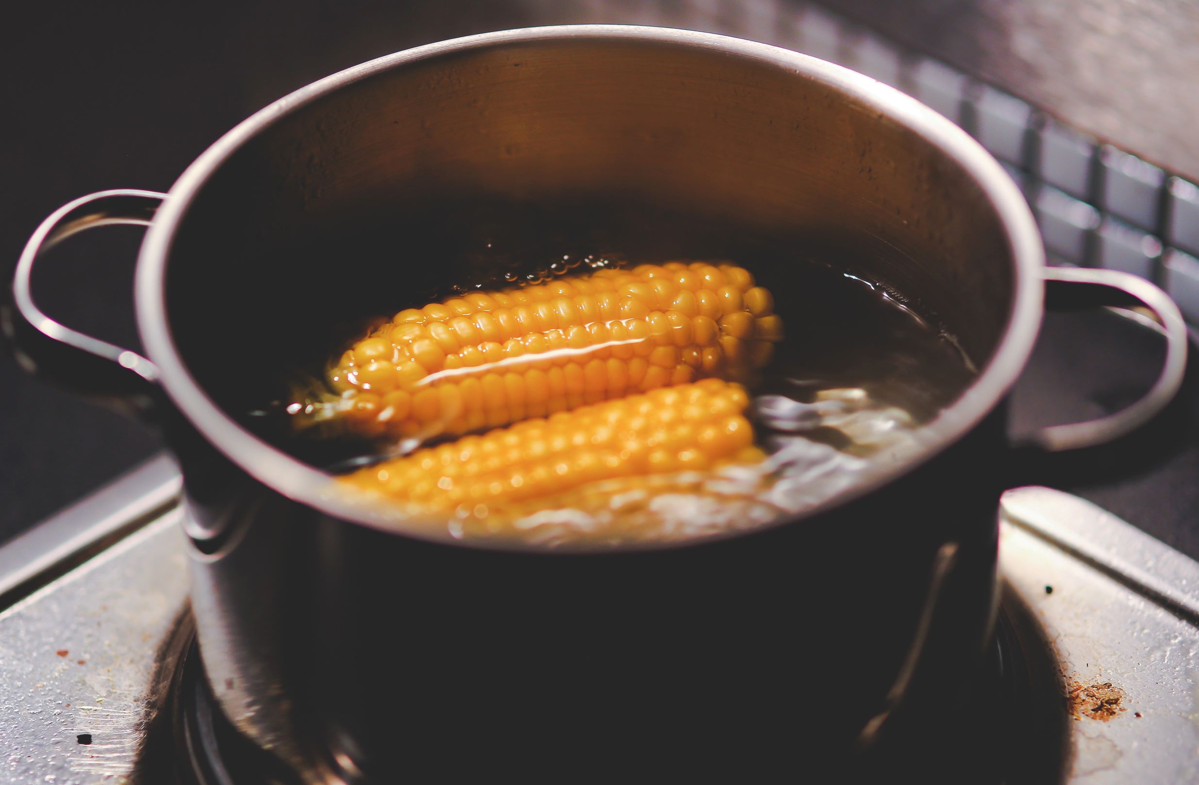 canva-cooking corn